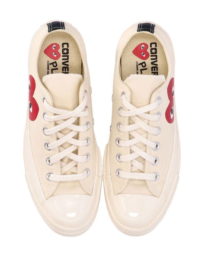 Sneakers with store heart logo