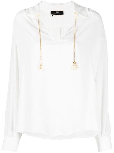 Blouse with chain