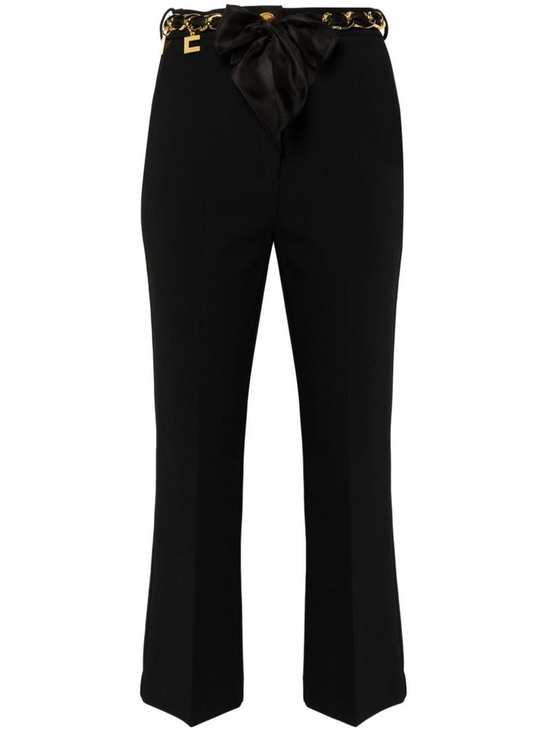 Pantaloni con catena