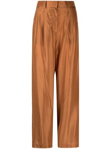 Trousers with pleated details
