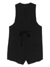 Long pointed vest with lacing