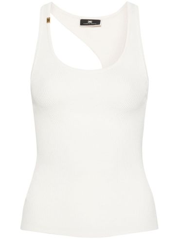 top with asymmetric cut at the back