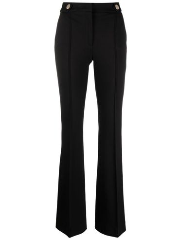 Flared viscose trousers with crease