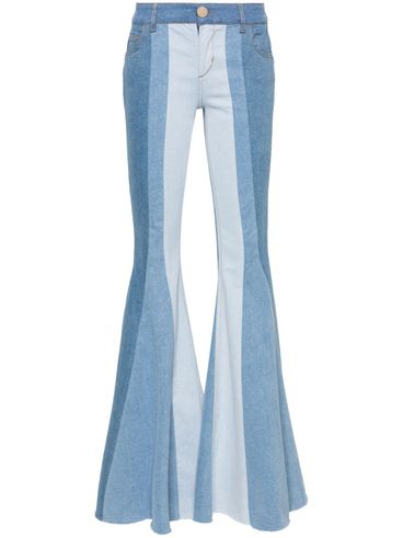 Jeans in cotone stretc svasati con design patchwork