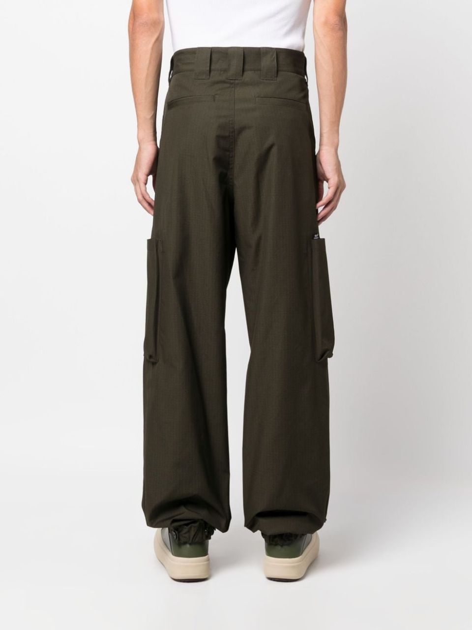 Tapered cotton trousers with pockets