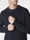 Crewneck cotton sweater with distressed effect