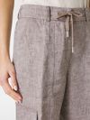 Linen trousers with side cargo pockets