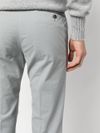 Pantaloni in cotone stretch con piega stirata