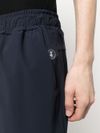 Pantaloni Michael in tuta in tessuto elasticizzato con logo