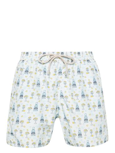 Swimsuit with gin and tonic print and lemons