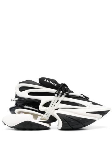 Sneakers 'Unicorn' bianco e nero con logo in rilievo