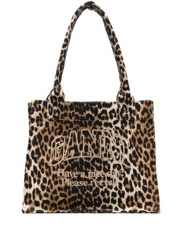 Large Tote bag in recycled cotton with leopard print design.