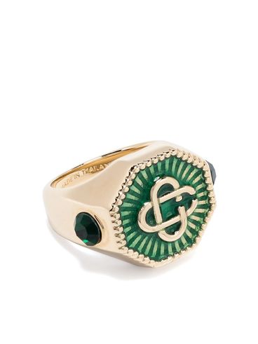 Gold brass ring with green enamel