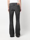 Bootcut low-rise cotton jeans with logo in metal