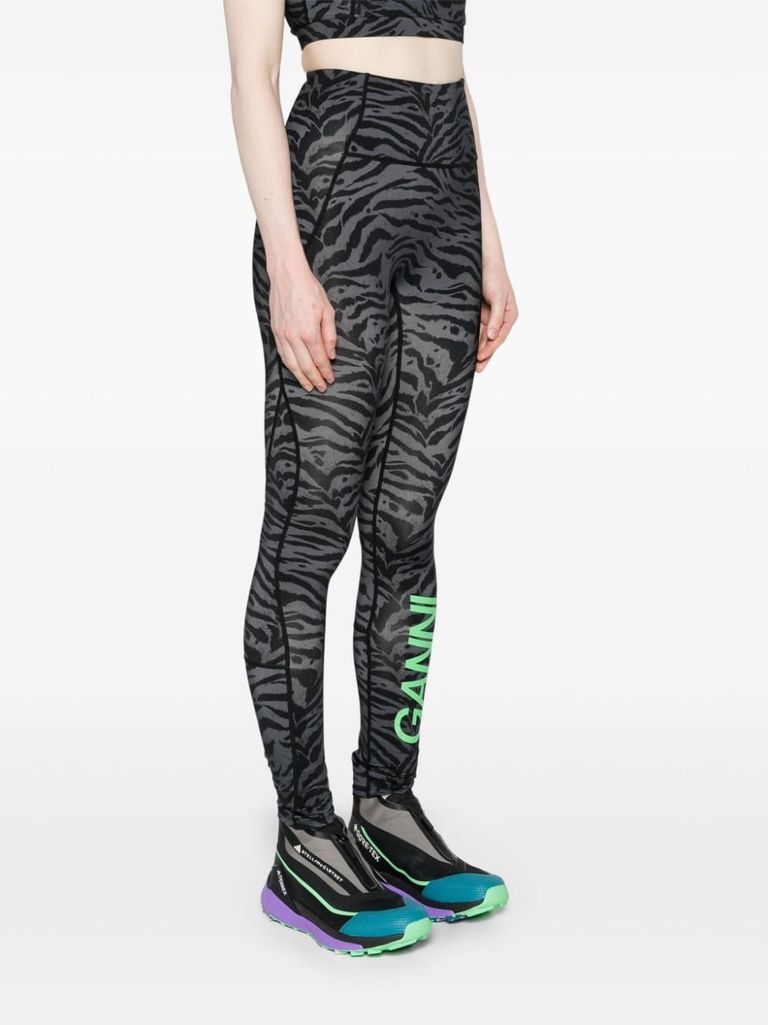 Shop Ganni Leggings In Recycled Nylon With Zebra Print. In Nero