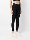 Stretch fabric leggings with front printed logo