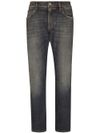 Straight cut stretch cotton jeans with distressed effect