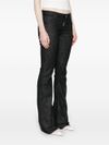 Flared stretch cotton jeans with mid-rise and distressed effect