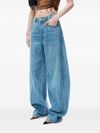 Wide-leg low-rise cotton-blend jeans