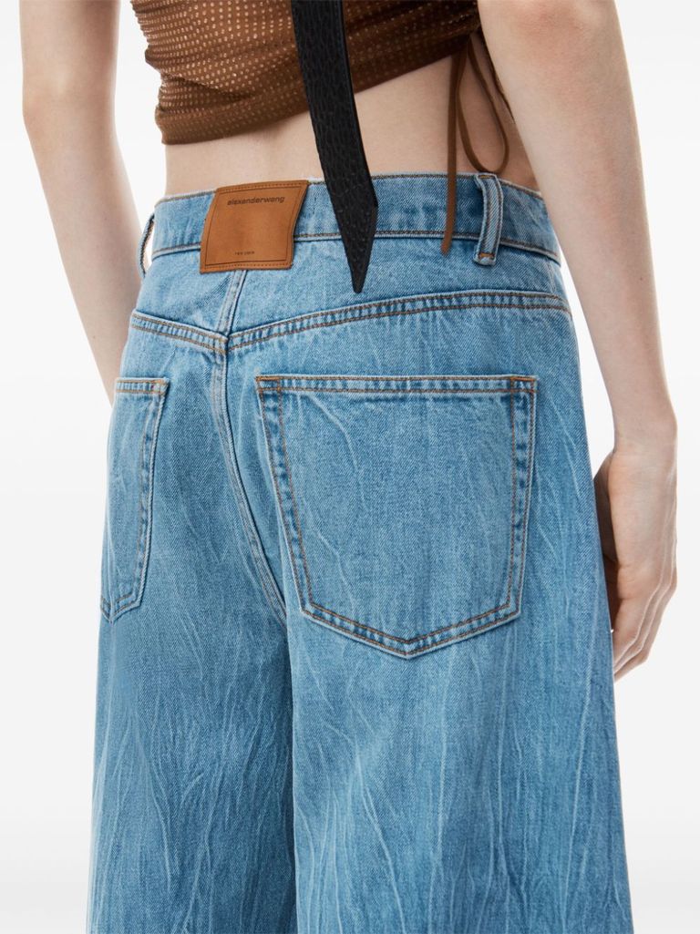 Shop Alexander Wang Wide-leg Low-rise Cotton-blend Jeans In Blu