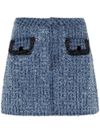 Mini denim skirt in cotton blend with pockets