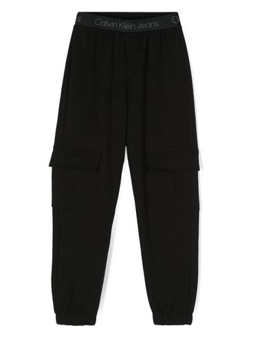 Cotton trousers with applied pockets