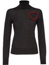 Wool turtleneck sweater with heart motif