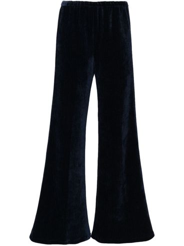 Ribbed trousers in recycled polyester