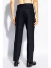 Tailored wool trousers with pressed crease