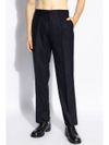 Tailored wool trousers with pressed crease