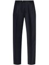 Tailored wool trousers with pressed crease