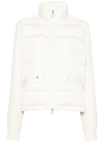 Ivory puffer jacket with inserts