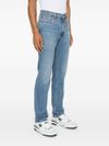 Straight-leg stretch cotton jeans with a mid-rise waist