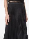 Long black pleated skirt