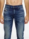 Jeans slim in cotone effetto sbiadito