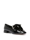 Black ballet flats with a heart-shaped neckline