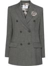 Blazer doppiopetto grigio con spilla a fiore