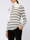 White striped shirt with black stripes and floral detail