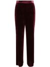 High-waisted bordeaux red velvet trousers