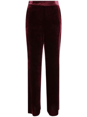 High-waisted bordeaux red velvet trousers