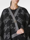 Poncho con frange 'Frine' nero