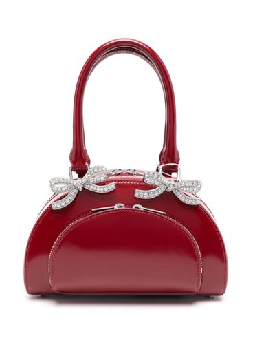 Crystal bow detail curved mini tote bag