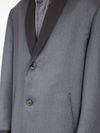 Single-breasted wool coat with contrasting lapels and cuffs