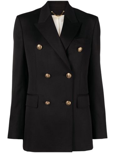 Double-breasted shoulder pads blazer