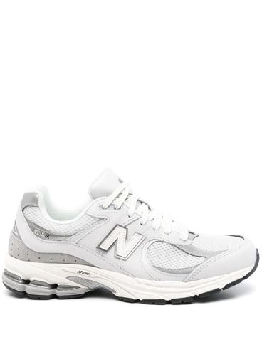 NEW BALANCE - 2002R sneakers in leather and fabric