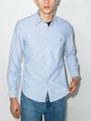 Slim fit light blue cotton shirt with embroidered logo