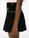 Embroidered logo pleated miniskirt