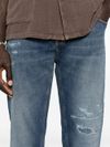 Jeans slim in cotone a vita media