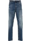 Jeans slim in cotone a vita media