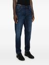 Jeans slim in cotone a vita media